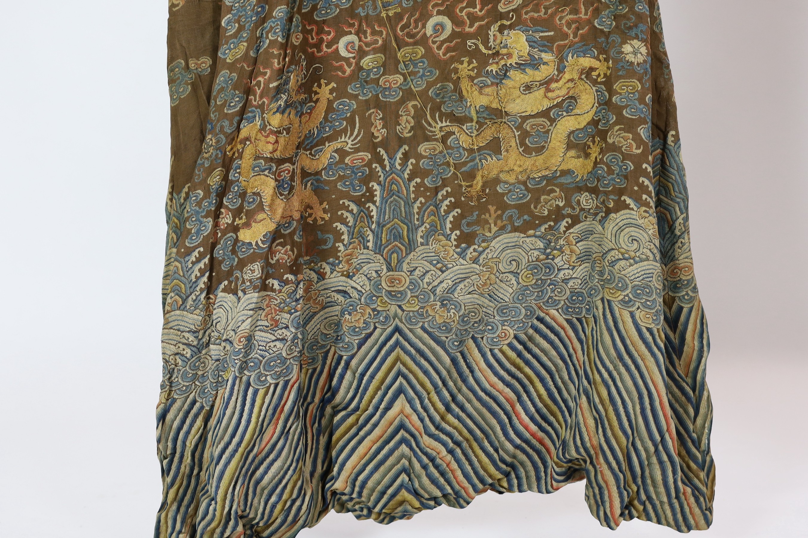 A Chinese embroidered silk and kesi gauze ’dragon’ summer robe, late Qing dynasty, some alterations and unpicked threads